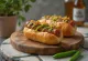 Choripán Sandwich mit gegrillter Wurst, Chimichurri und frischen Chiliringen