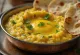 Khichdi mit Moong Dal Linsen, garniert mit frischem Koriander