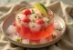 Wassermelonen-Hwachae mit Minze, mit frischer Melone serviert